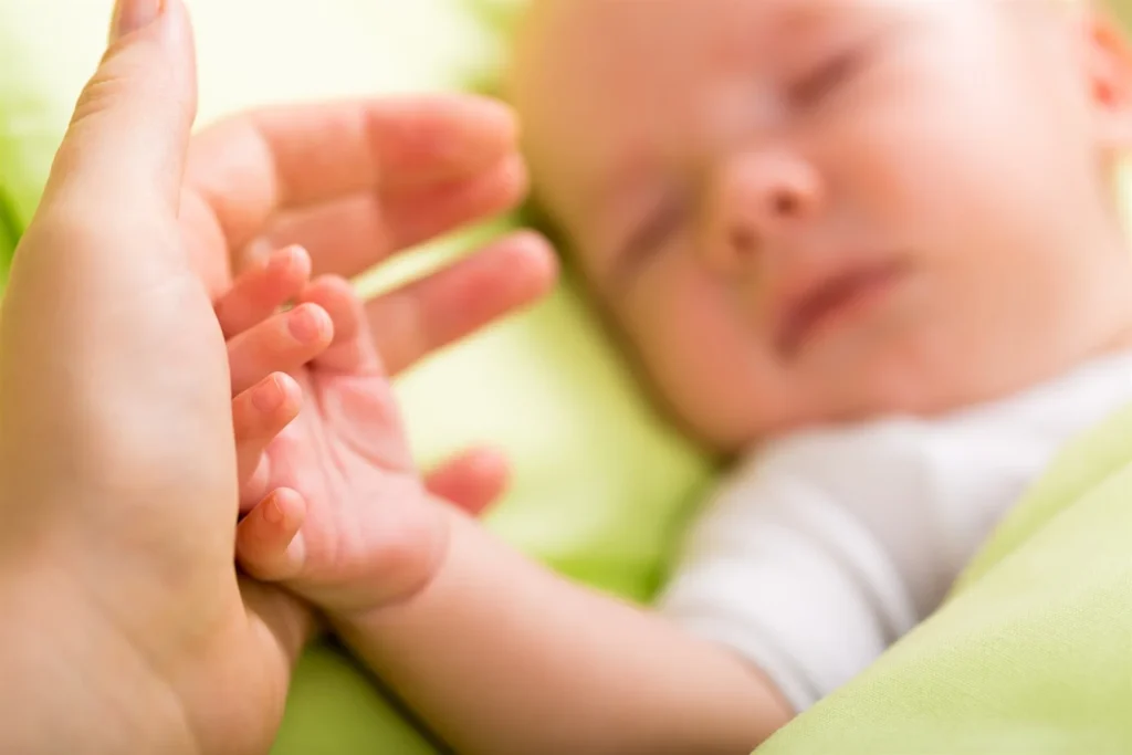 New Born Baby Hand Holding